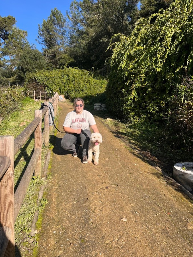 Dog walking on a green trail in Estoril